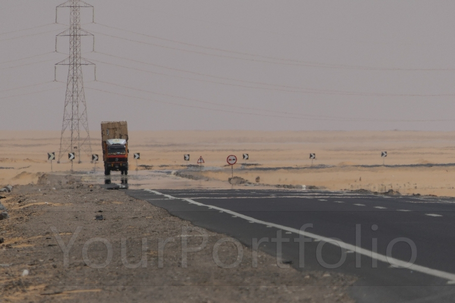 photographer Bitten by the Bug travel  photo. the drive from aswan to abu simbel takes several hours across a largely featureless desert  there is just this one truckstop along the way where travellers can get out and stretch their legs.